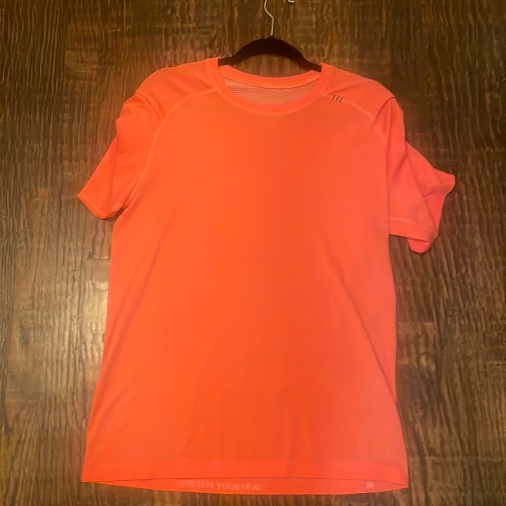 Orange neon Lululemon metal vent shirt good condition.